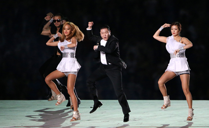 Global sensation Psy dances for the athletes and spectators alike, as he performs his hit song “Gangnam Style” during the opening ceremony of the Incheon Asian Games 2014.