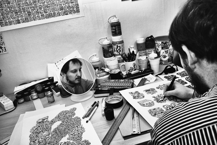 Boyane Zel is the collaborating artist. Here in his draft room his imagination and skills prepare illustrations for the Varyd fashion collection. 