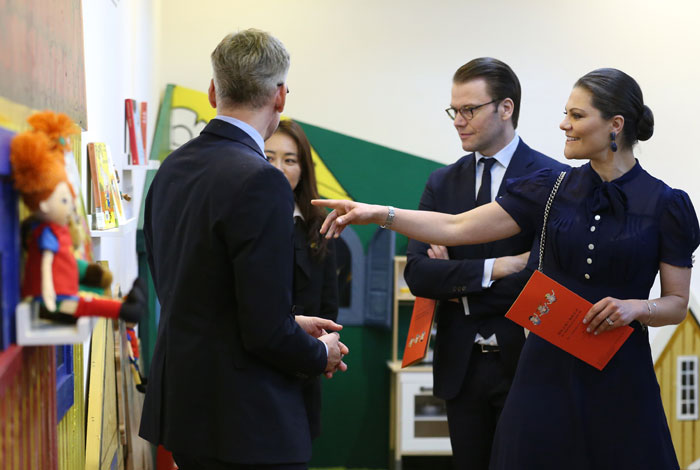 Swedish Crown Princess Victoria (right) and her husband, Prince Daniel (second from right), look around the 'Astrid Lindgren and Pippi Longstocking' exhibit currently underway at the National Library for Children & Young Adults, in southern Seoul on May 25.