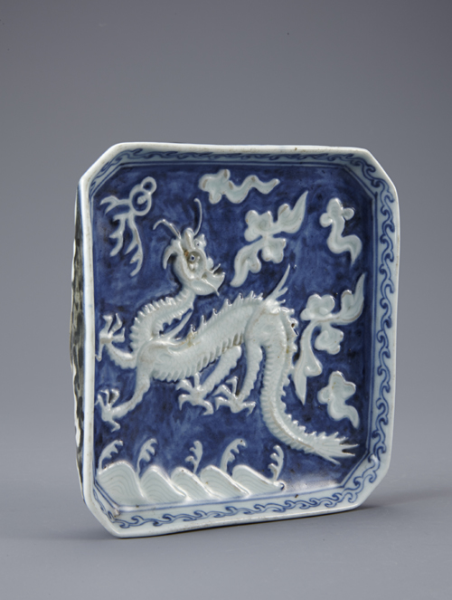 A plate with a dragon motif is from the 19th century Joseon era. 
