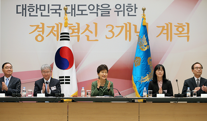 President Park Geun-hye applauds during the fourth National Economic Advisory Council and Economic Ministers’ Meeting on February 25, the first anniversary of her inauguration. (photo: Cheong Wa Dae)