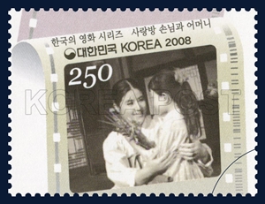 'Mother and the Guest' (1961) by Shin Films. Choi Eun-hee (left) holds her in-film daughter, played by Jeon Young-sun, in her arms. (image: Korea Post)