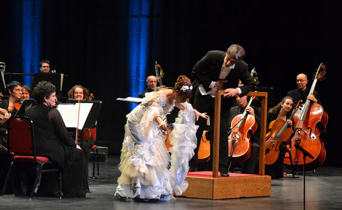 Soprano Sumi Jo (center) bows to the audience during her concert at the National Arts Center in Ottawa on November 26.