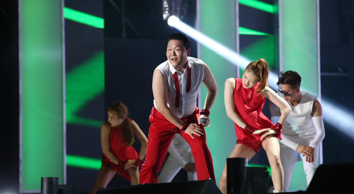 Psy performs his 'Gangnam Style' at the Summer K-pop Festival held in Seoul Plaza on Aug. 4.