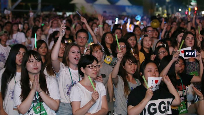 Fans cheer on their pop stars during the Summer K-pop Festival on Aug. 4.