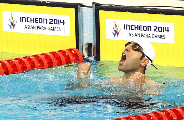  Vahid Keshtkar of Iran wins the gold medal, setting a new Asian record of 5:06.07 in the men's 400 meter freestyle S13 final at the Munhak Park Tae-hwan Aquatics Center on October 19. 