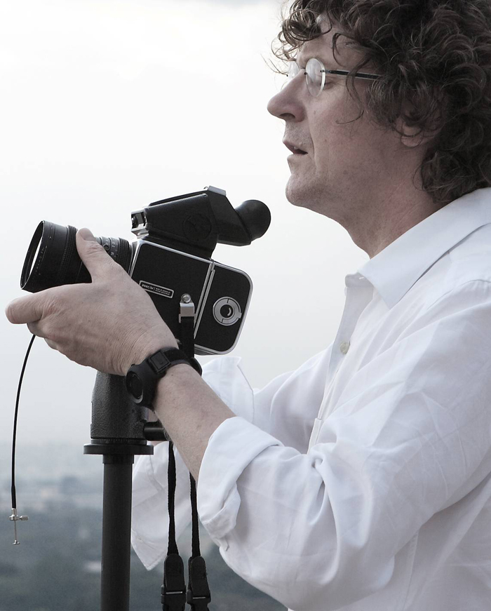  Michael Kenna holds his film camera. (Photo courtesy of the Gallery KONG) 
