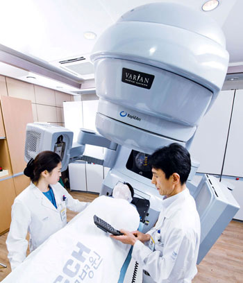 A cancer patient is receiving radiation therapy. 