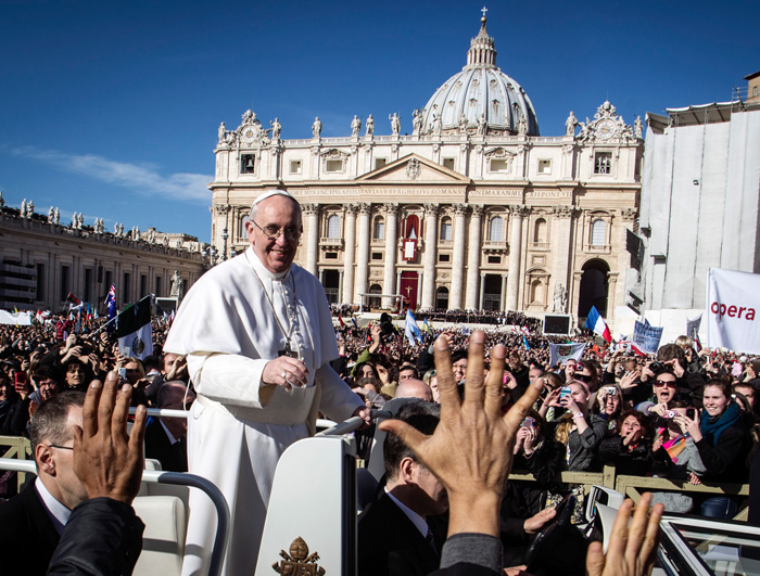 Pope Francis is driven through the crowd in his popemobile in St. Peter's Square for his inauguration mass at the Vatican on Tuesday, March 19 (photo: Yonhap News). 