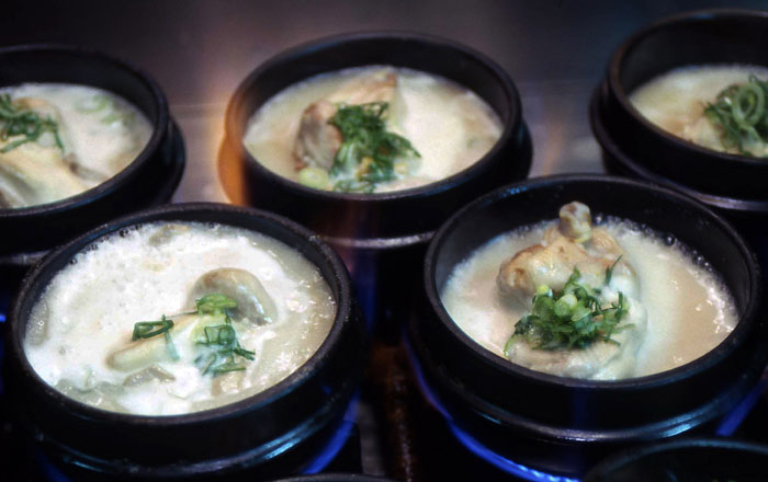 Ginseng chicken soup is one of the most popular Korean dishes. Having chicken and ginseng as its main ingredients, the dish makes people hotter and causes them to sweat, giving them energy and strengthening their immune system.