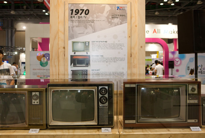 The exhibit shows off black and white TVs that were made in the 1970s.