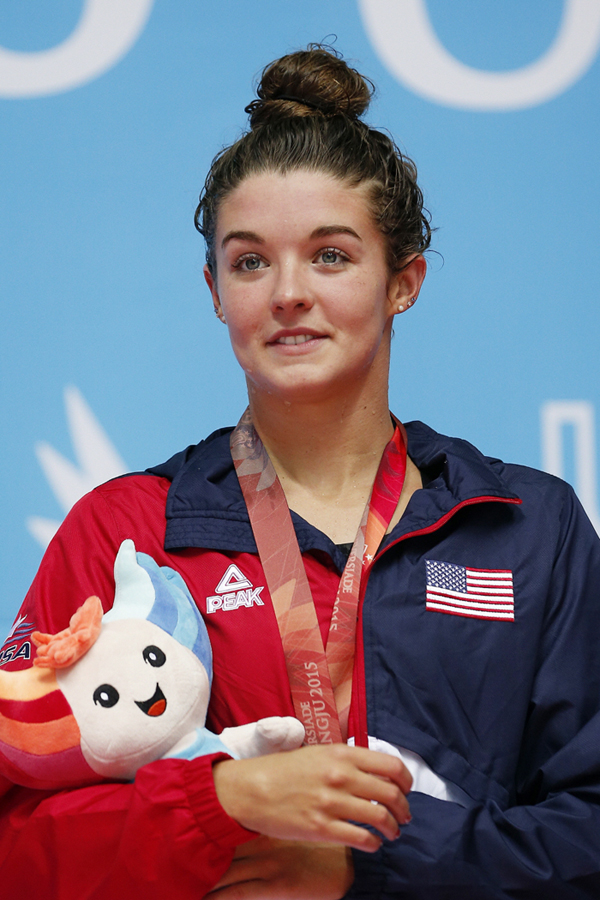  Rachel Bootsma, a member of the U.S. national swim team, stands on the podium after winning a bronze medal in the women's 100-meter backstroke on July 7. 