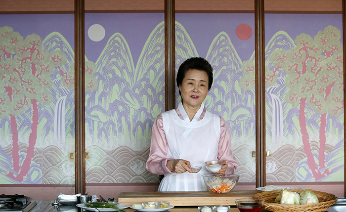 Director Yoon Sook-ja of the Institute of Traditional Korean Food prepares a kimchi stuffing with shredded vegetables, carrots, radish, salt and salted shrimp.