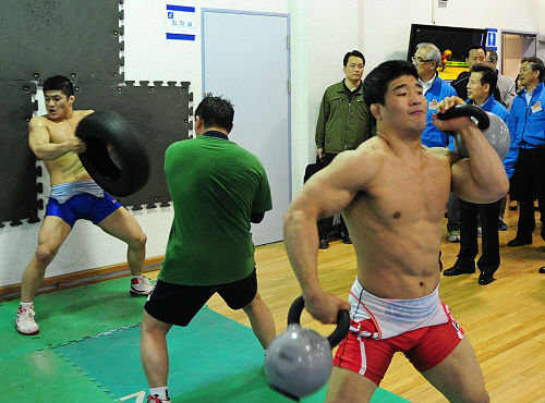 National Olympic athletes train in full gear at Taereung National Village on April 18, eying to bolster the medal tally for a top-ten finish at the upcoming London Olympics