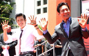 Lee Byung-hun and Ahn Sung-ki leave their prints in Hol...