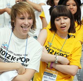K-Pop competition finalists assemble in a flash mob