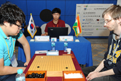 ‘Go’ players from 54 countries compete with black, white stones 