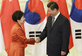 Korea, China strike free trade pact