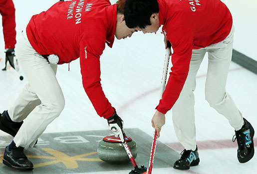 Men's curling team on its way to Olympics