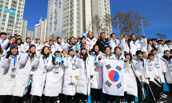 South, North Korean athletes enter Olympic Village