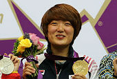 South Korean shooter Kim Jang-mi fires golden flare