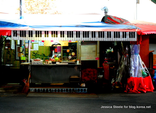A tent decorated to look like a keyboard, one of the market’s many whimsical sights