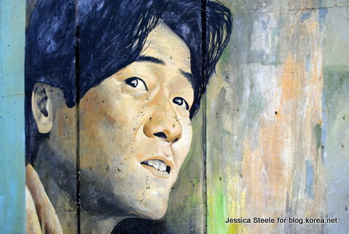 Portrait of the late singer Kim Kwang-Seok at his memorial street in Daegu
