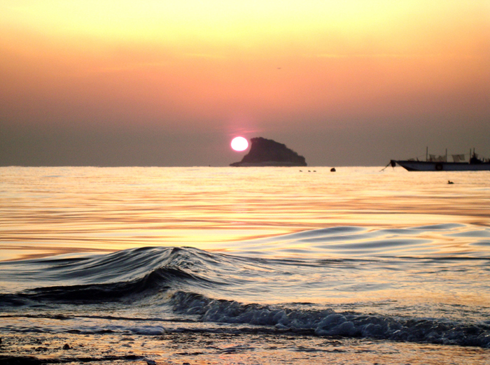 The sunset falls behind Maerangdo Island, or "Shark Fin" Island, off of Geojampo. 