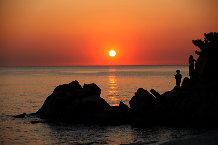 The Seonnyeo Bawi Rock, or Celestial Maiden Rock, sits of off the Seonnyeo Bawi Beach. 