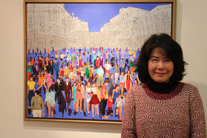 Park Ju-kyong, working as both a firefighter and an artist, tells her novel-like life story. The picture in the background is her prize-winning piece “Citizens”. (photo: Wi Tack-whan) 