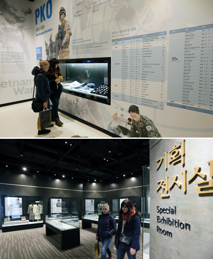Tourists Daria Chabrova (right) and Tatiana Zaremba look around the exhibition. (photos: Jeon Han) 