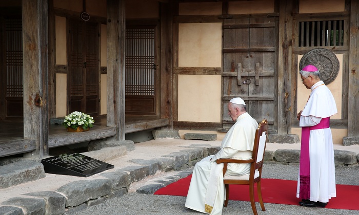Pope Francis pays tribute to Korea's first Roman Catholic priest after laying a wreath at the birthplace of St. Andrew Kim Dae-geon on August 15.