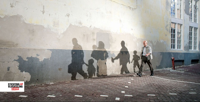 This public campaign was released on World Refugee Day 2014 by Stichting Vluchteling, a Netherlands' Refugee Foundation. There is only one man in the picture but shadows for six more people. The advertisement suggests that there are lots of refugees in the world who are suffering from poverty, fear and pain but hide it all.