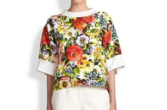 A white t-shirt with a loud colored print