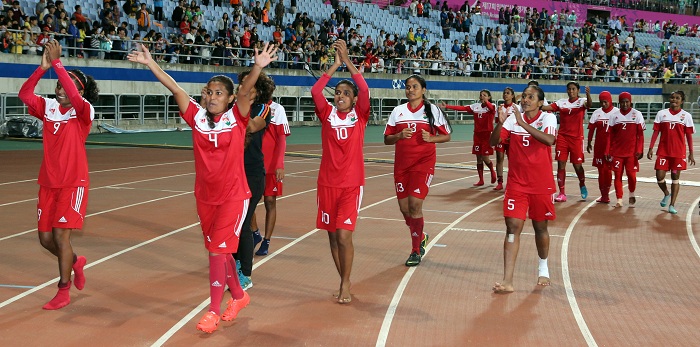 The Maldives participates in a preliminary match in the women's football competition during the 2014 Incheon Asian Games. They lose the game, but smile nonetheless as they wave to their fans and spectators. (photo: Yonhap News)