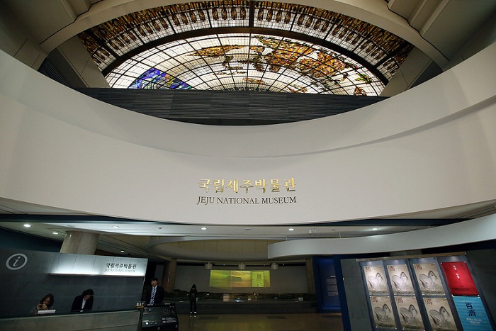 The museum's central hall is adorned with stained glass portraying the island's founding myth of Hallasan Mountain and three abundant items: lava stones, wind and the womenfolk.