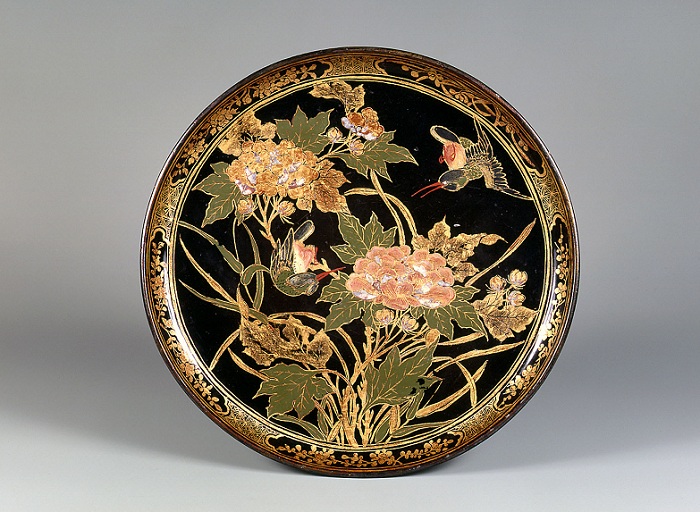 A black lacquerware plate from the Urasoe Art Museum. Visitors can get a peek into the kingdom's lacquerware production methodology and technique.
