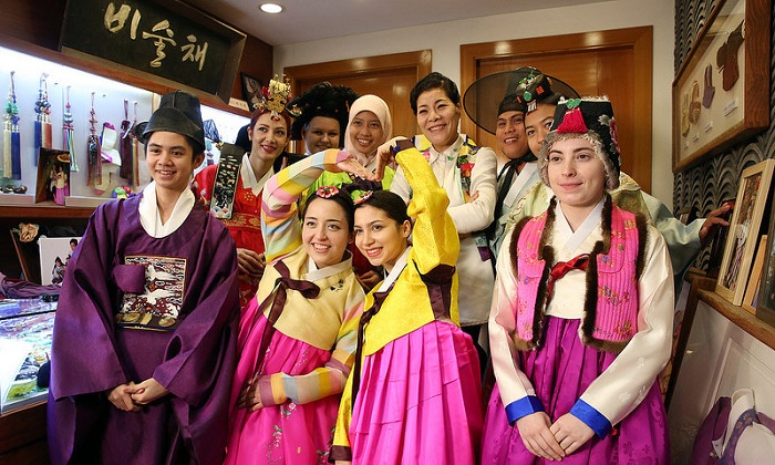 The lucky winners dress in Hanbok on December 26 at Park SulNyeo's Hanbok shop and pose for a group photograph.