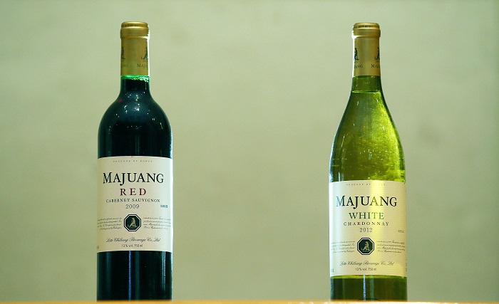 Majuang Red (left) and Majuang White are blended with grapes grown at the Majuang winery in Gyeongsan, South Gyeongsang Province.