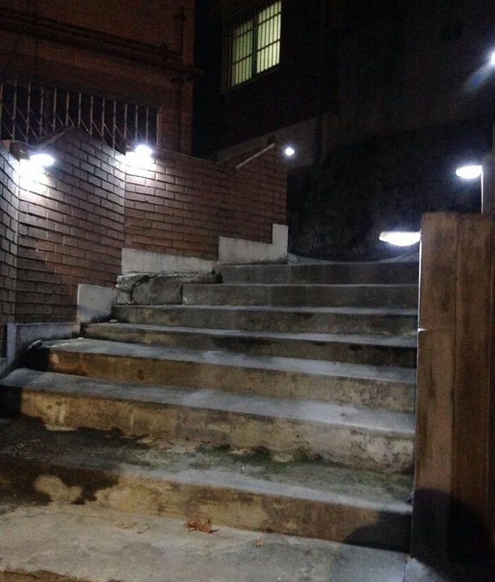 'City Fireflies' -- solar powered street lamps made from milk cartons -- light up an alleyway in Haengchon-dong, Jongno-gu (District).