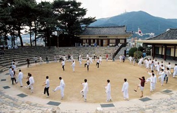 University students practice a traditional mask dance.