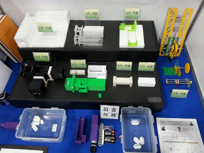 The exhibit shows how Park developed a lighter and cheaper microscope.
