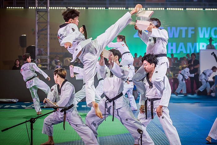 The World Taekwondo demonstration team of South Korea on June 24 gives a breaking demonstration in the opening ceremony of the 2017 World Taekwondo Championships at Taekwondowon in Muju-gun County, Jeollabuk-do Province. (WTF)