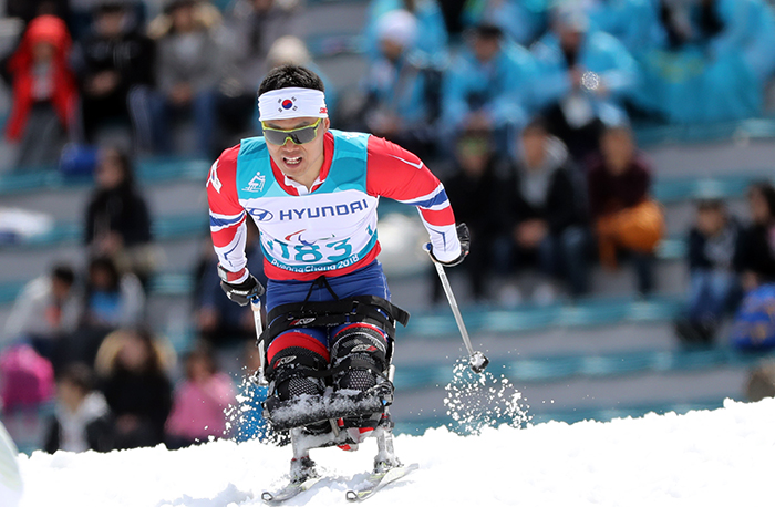 Sin Eui Hyun sprints in the men’s 7.5 km sitting biathlon race at the PyeongChang Biathlon Centre, in Pyeongchang on March 17.