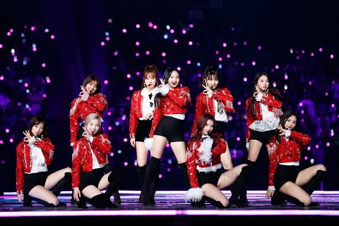 The nine-member girl band TWICE on Dec. 12 performs on stage at the 2018 Mnet Asian Music Awards (MAMA) Fans’ Choice in Japan held at Saitama Super Arena in Saitama City, Japan.