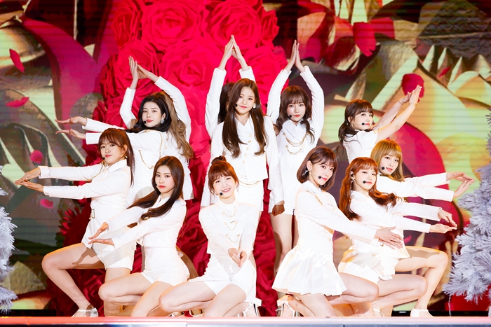 The new Korean-Japanese girl band IZ*ONE on Dec. 17 performs on stage during the 2018 Mnet Asian Music Awards (MAMA) Premier at Dongdaemun Design Plaza (DDP) in Seoul.