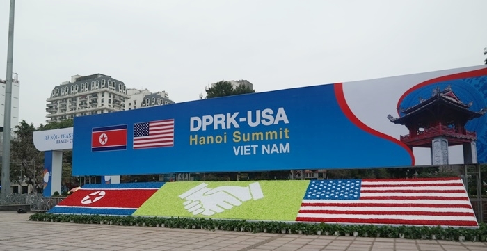 A large billboard across the international media center publicizes the second summit between North Korea and the U.S. in Hanoi.