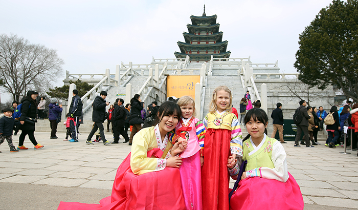 Students and young non-Korean visitors wear Hanbok, traditional Korean attire, and smile for the camera on Lunar New Year's Day, February 19. 
