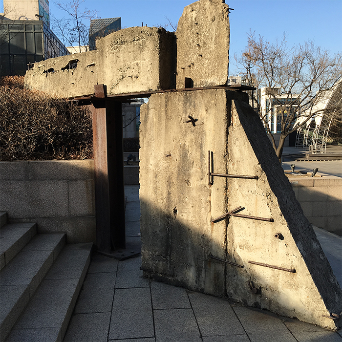 This installation work has a warning message that says, 'Do not touch. Dangerous.'