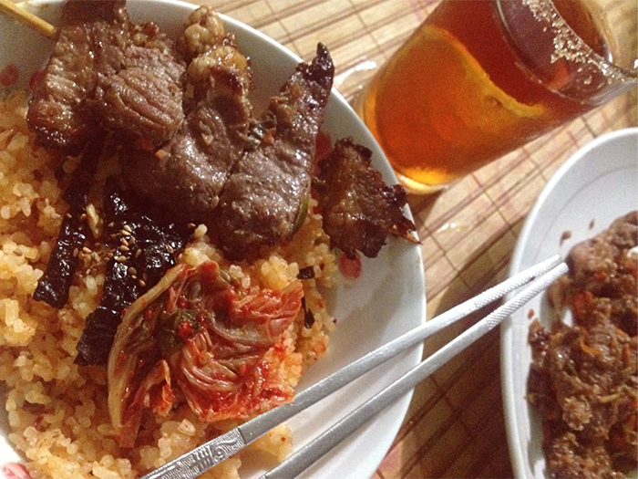 Delicious bowls of kimchi fried rice can be paired with Korea-style barbeque.